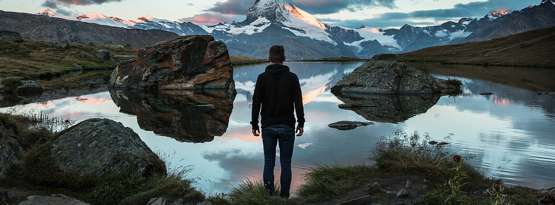 Man Looking at Mountain